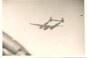 Herb's photo taken from the cockpit of his P-38 of his wingman's P-38.
